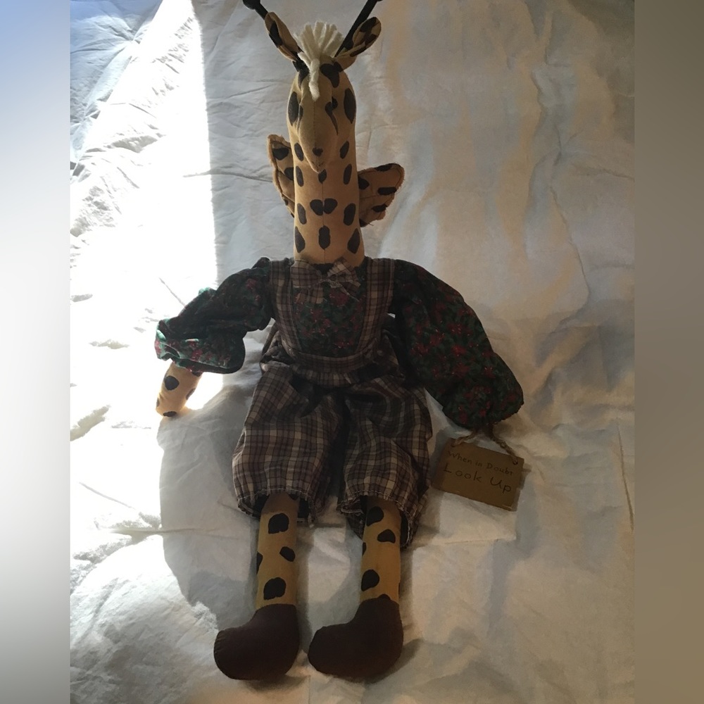 Shelf sitting, giraffe, not a toy smoke free home